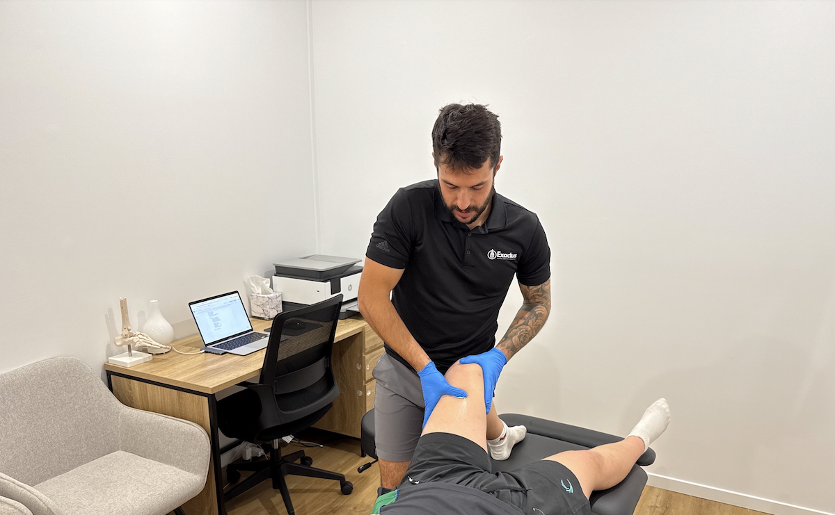 Caloundra chiropractor providing soft tissue therapy during treatment